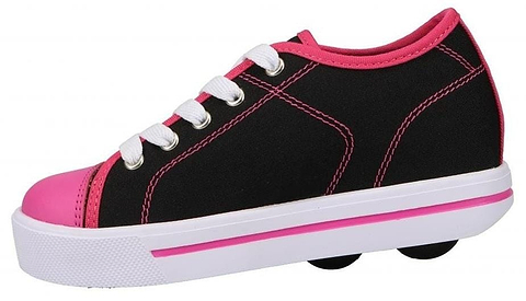 The Heelys Classic X2 Girls Shoes in black, white, and hot pink feature a Canvas/Nylon upper, white laces, a thick white sole with a pink stripe, and two low-profile wheels in the heel for rolling fun.