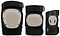 The REKD Shield Triple Skate Protection Pad Set in Black/Beige includes a knee pad and elbow pad with beige hard shells, plus a wrist guard with a high-impact palm splint—all offering premium action sports protection and featuring the REKD logo.