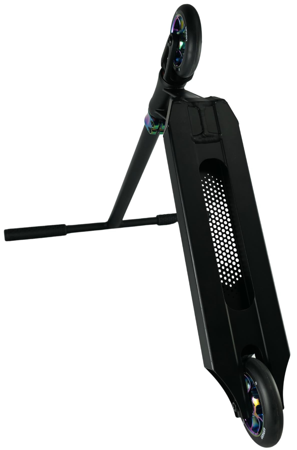 The Union Dot Complete Stunt Scooter by Union in black/neochrome stands upright on one wheel with angled handlebars and a perforated deck. Its wheels have a metallic, iridescent finish. The background is plain white.