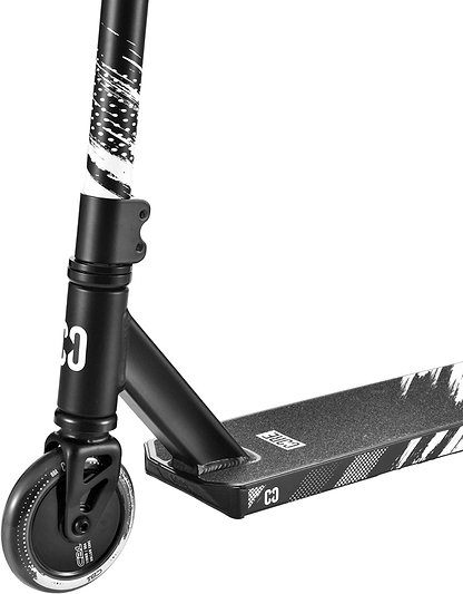 Close-up of the CORE CB1 Beginner Complete Stunt Scooter by CORE in black, highlighting the front wheel, deck, and handlebar with stylish graphic designs—ideal for beginners.