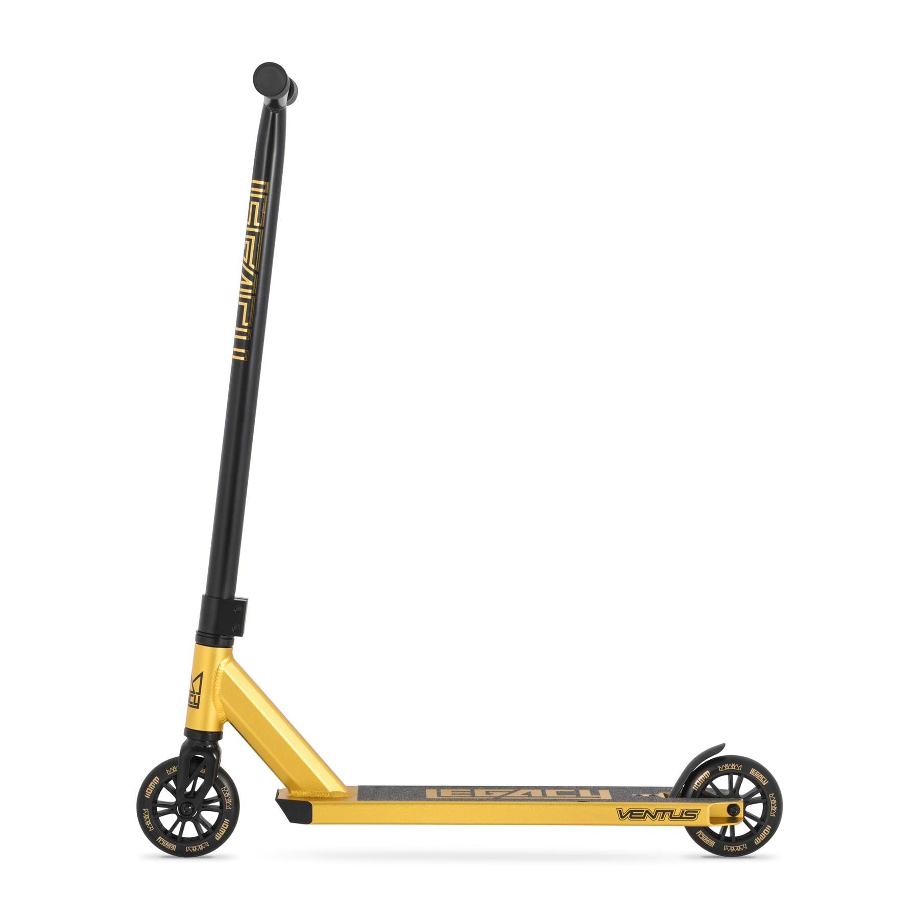 The Legacy Ventus Complete Stunt Scooter in gold and black features a black handlebar, two small wheels, and "Venture" on the deck—perfect for skatepark tricks. Shown from the side on a white background.