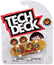 The Tech Deck 96mm M57 Fingerboard - Grimple Stix features a yellow deck with a cartoon monster graphic and "Grimple Stix" branding. Tech Deck logo and warning labels are displayed on the packaged collectible skateboard.