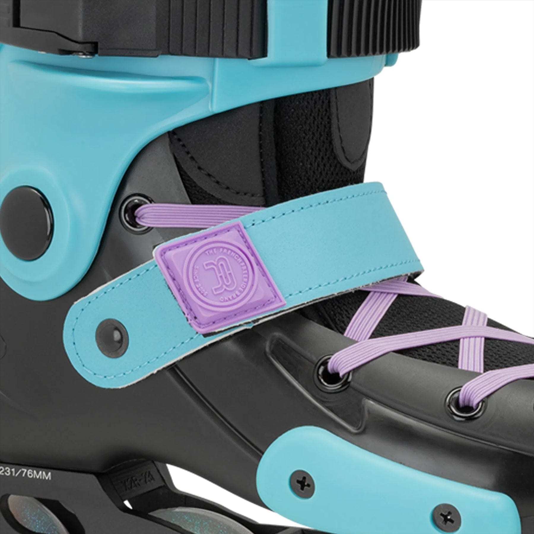 Close-up of the FR Skates Junior Adjustable Inline Skates in Luminous Black Pearl, showcasing a turquoise and black boot with a purple strap and lilac laces. Featuring Street King wheels for smooth rides, this sporty design shines with its multiple small wheels.