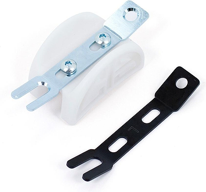 Two Chicks In Bowls Roller Skate Slide Blocks - White are shown on a white surface: one silver bracket is attached to the white slide block, while the black bracket stands alone. Both have prong-like ends and screw holes for mounting.