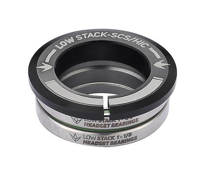 The Blunt Envy Low Stack SCS Integrated Stunt Scooter Headset in black boasts a sleek and sturdy design, featuring minimalist aesthetics with sealed bearings and stacked rings. The headset displays the phrases "LOW STACK-SCS/HIC" and "HEADSET BEARINGS.