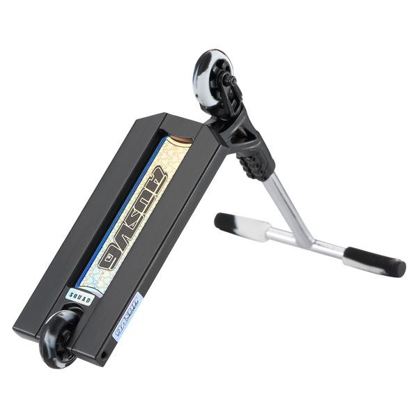 The Blunt Envy AOS V6 Finger Scooter in black is shown from a low angle, highlighting its colorful graphic deck and two small wheels, with the handlebars turned sideways.