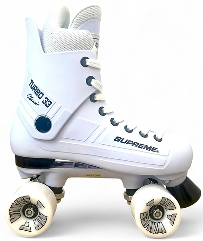 The Supreme Turbo 33 Nylon Quad Roller Skates in white feature white wheels, black accents, a high ankle cuff, white laces, and are branded "Supreme" for style and support.