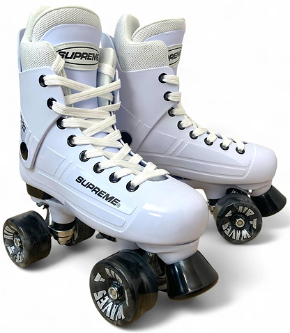 A pair of Supreme Turbo 33 Nylon Quad Roller Skates in white with black swirl wheels and white laces, shown against a plain white background.