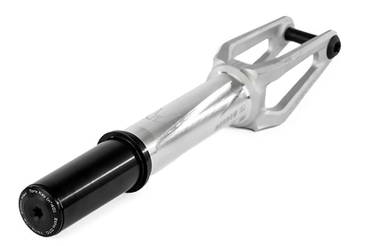 The Ethic DTC Merrow V3 IHC Stunt Scooter Fork in raw silver, made by Ethic from 7075 aluminium, features an open angular design, visible engraving, and a black cylindrical axle mount. Photographed on a white background.