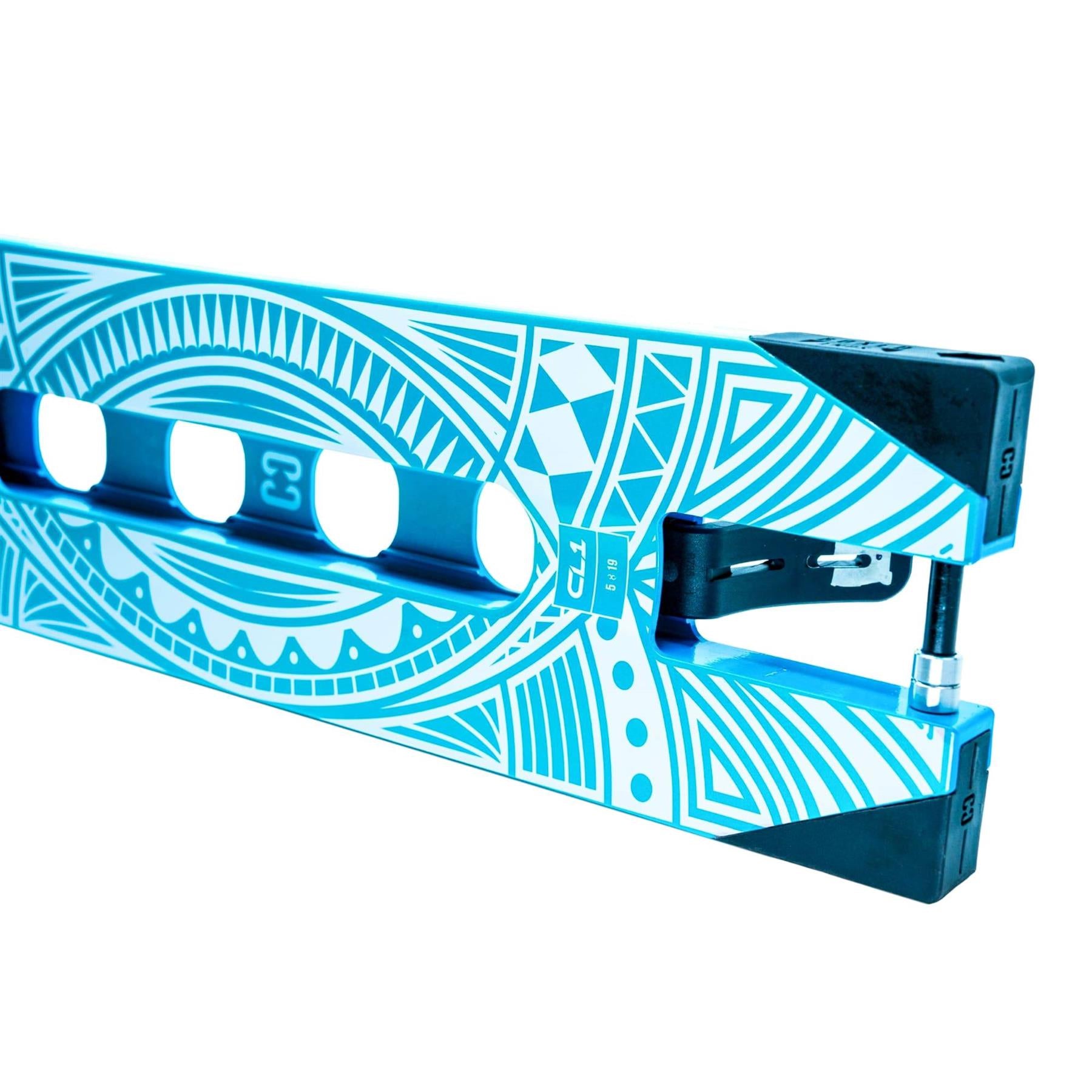 A close-up of the CORE CL1 Teal "Turtlesent" Stunt Scooter Deck (5" x 19") featuring bold geometric designs in teal and white, with black accents on the ends.
