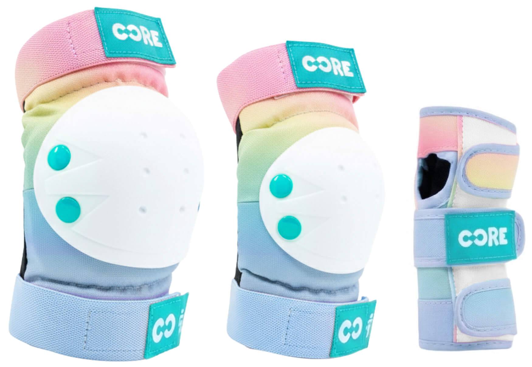 The CORE Junior Triple Skate Protection Pad Set - Pop includes pastel-colored knee/elbow pads with white hard shells and a wrist guard, all with teal patches featuring the “CORE” label.