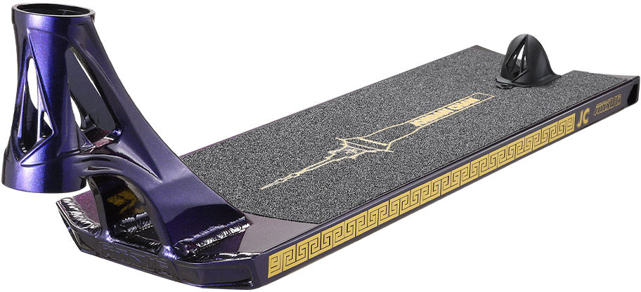 Introducing the Blunt Envy AOS V6 Jordan Chan Signature Stunt Scooter Deck - 6.5″ x 22.5″, featuring a vibrant purple finish, a black grip surface bordered with gold geometric detailing, and an eye-catching graphic of the Empire State Building. The deck’s precisely angled headtube pairs with a sleek black brake for optimal performance and style.