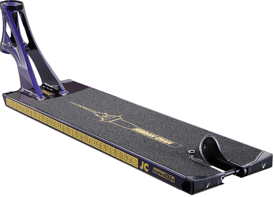 A close-up of the Blunt Envy AOS V6 Jordan Chan Signature Stunt Scooter Deck (6.5″ x 22.5″) showcases a sleek black finish with gold detailing, grip tape, and striking graphics including a sword and Greek-inspired patterns, emphasizing its distinctive Jordan Chan signature design.