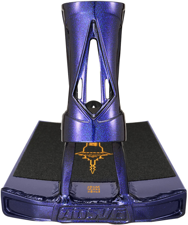 A Blunt Envy AOS V6 Jordan Chan Signature Stunt Scooter Deck in metallic purple, featuring black grip tape, a yellow graphic, and an open-frame headtube design, shown from the front.