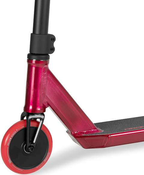 Close-up of a red and black Drone Predator 1 Complete Stunt Scooter deck, front wheel, fork, and handlebar.