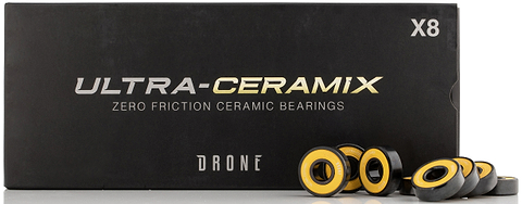 Eight Drone Ultra-Ceramix Scooter Bearings arranged in front of their rectangular black product box.