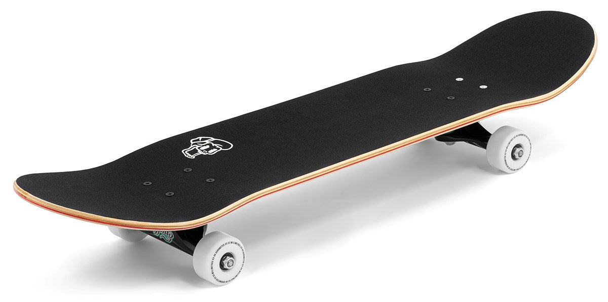 The Enuff Pyro III Red Complete Skateboard (7.75" x 31.5") by Enuff features white wheels, a wooden edge, and a skull graphic on the griptape, made from 7-ply maple and shown angled on a white background.