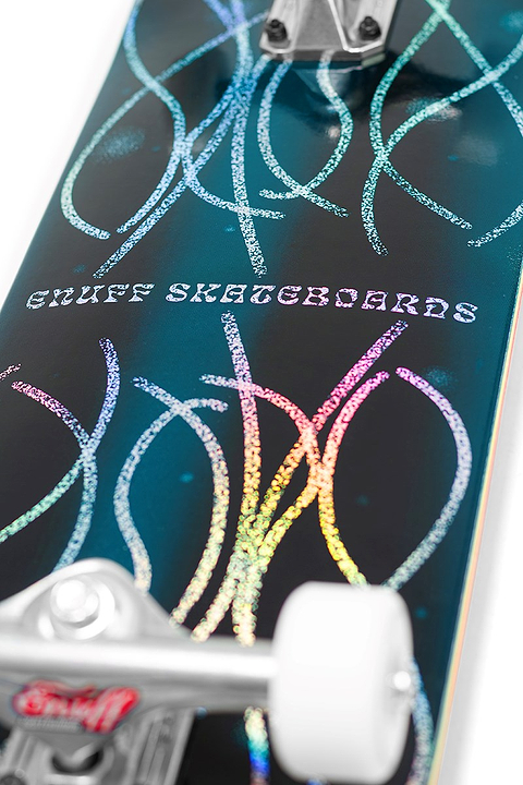 Close-up of the Enuff Abyss Jellyfish Complete Skateboard (8.0" x 32.0") by Enuff, featuring holographic abstract line art and "Enuff" at the center. Maple deck, with wheels and trucks partly visible at the edges.