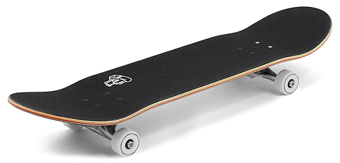 The Enuff Throwback Black Complete Skateboard (8.5" x 32.1") features 7-ply maple, white wheels, and a graphic grip tape. Shown from a side angle, its wooden edge and layered design evoke a subtle retro vibe. Brand: Enuff.