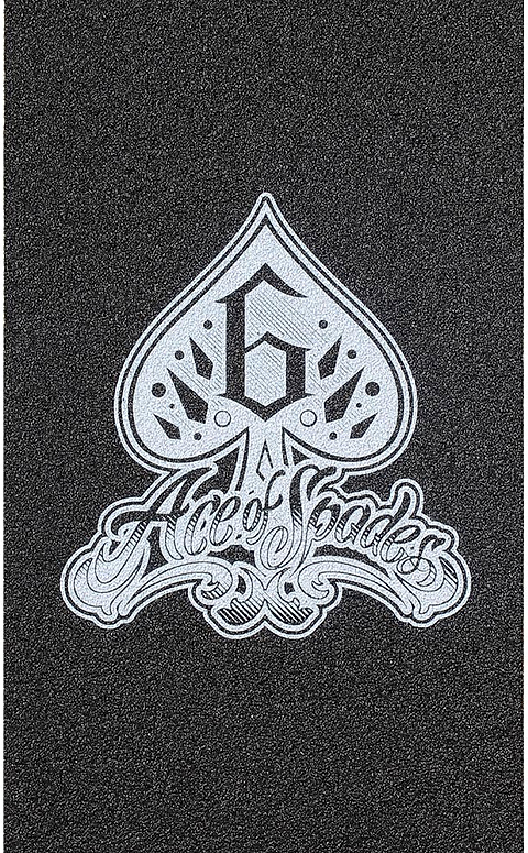 Featuring a black textured surface with a white spade graphic containing the number 6 and stylized “Ace of Spades” script below, the Blunt Envy AOSV6 Stunt Scooter Griptape - Spade combines standout style and grip to enhance your ride.