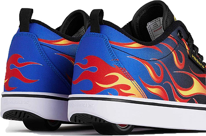 A pair of Heelys Pro 20 Prints boys shoes by Heelys, in black, blue, red, and yellow with bold flame designs, showcasing a single wheel concealed in the soles and displayed from the back and side.