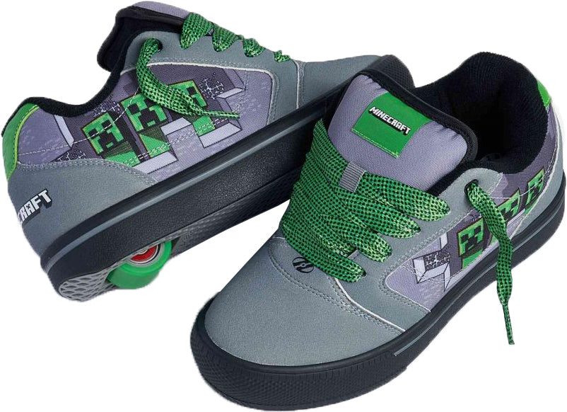 Heelys x Minecraft Pro 25 Prints Boys Shoes - Grey / Green feature green laces, Creeper faces on the sides, and Heelys x Minecraft logos on the heel and tongue.