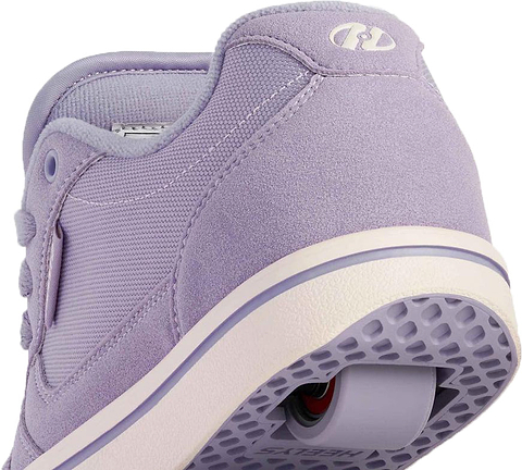 A close-up of the Heelys Pro 25 Girls Shoes - Purple / Cream by Heelys, showing a single wheel in the heel—fun wheeled sneakers perfect for active kids.
