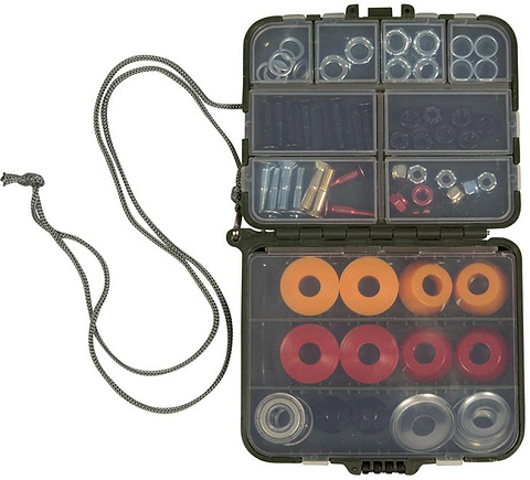 A compact, open plastic container from Independent, featuring compartments filled with assorted metal nuts, washers, screws, colored rubber grommets, and a gray cord attached—ideal for organizing your skateboard spare parts as part of the Independent Genuine Spare Tool Skateboard Set.