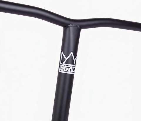 Close-up of the Legacy Steeltanium Chromo Lite Oversized HIC/SCS Stunt Scooter Bars in black (680mm x 610mm), featuring a white "LEGACY" logo with crown outline on durable chromoly steel, shown against a plain white background.