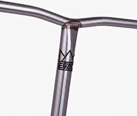 Close-up of the Legacy Steeltanium Chromo Lite Oversized HIC/SCS Stunt Scooter Bars (680mm x 610mm), made from durable chromoly steel with a welded joint and black Legacy crown logo on the vertical bar, set against a plain white background.