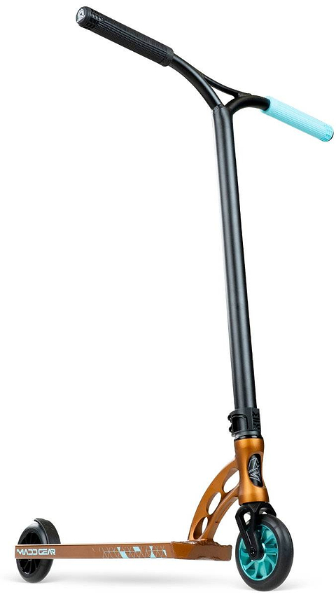 The Madd Gear (MGP) VX Origin IV 500 Complete Stunt Scooter – Deltoid features an orange deck with the "Madd Gear" logo, teal front wheel, black rear wheel and handlebars, and a blue grip on one side. Lightweight design for freestyle stunts.