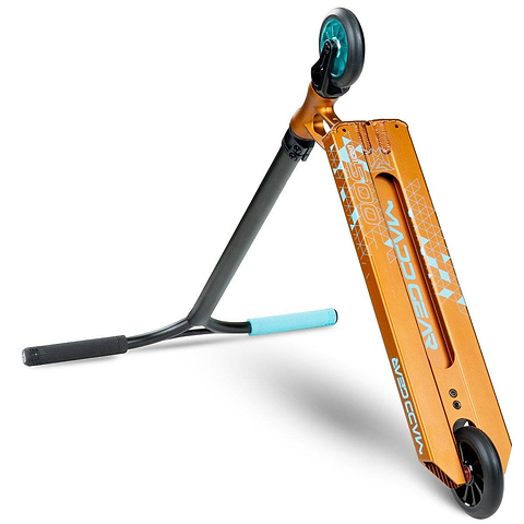 The Madd Gear (MGP) VX Origin IV 500 Deltoid stunt scooter features an orange frame, turquoise front wheel, blue handlebar grips, and white geometric deck graphics, shown angled to showcase its deck and handlebars.