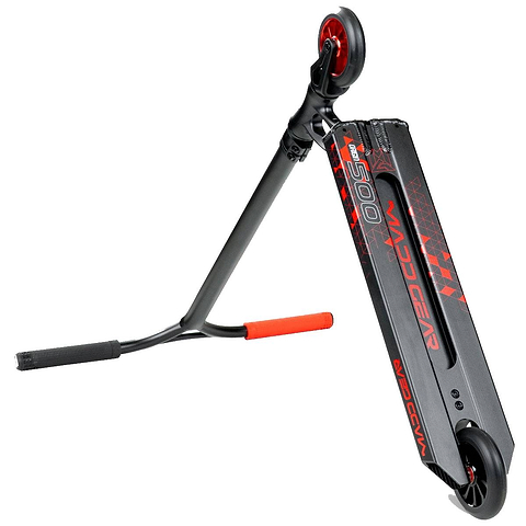 A black and red stunt scooter with one wheel raised, grips on the handlebars, and a deck labeled "Madd Gear" and "VX8 PRO," perfect for fans of the Madd Gear (MGP) VX Origin IV 500 Complete Stunt Scooter - Trigon or pro scooter enthusiasts.