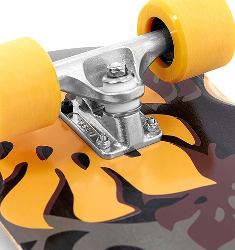 Close-up of the Mindless Oasis Cruiser Skateboard 32″ x 9″ - Black, featuring a skateboard truck, yellow wheels, abstract black-and-yellow graphics, and visible wood grain—ideal for cruising city streets.
