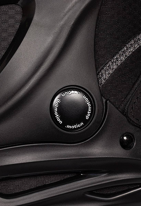 Close-up of a black .motion Dreamstate Inline Skate featuring a circular adjustment dial with the word “dotmotion” printed around its perimeter.