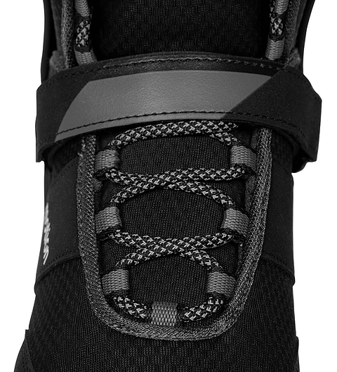 Close-up of black .motion Dreamstate Inline Skates featuring crisscross laces, a wide top strap, and a supportive cuff.