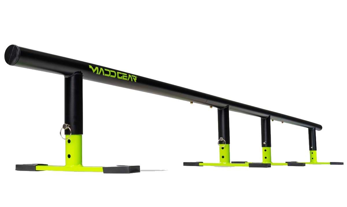 The Madd Gear MGP Ninety9 Grind Rail - 251cm, in black and neon yellow with four legs, is sturdy and ideal for skateboarding, scooters, or BMX tricks—perfect for practicing all your favorite moves.