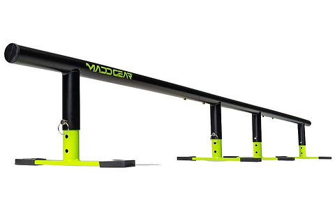 The Madd Gear MGP Ninety9 Grind Rail - 251cm, in black and neon yellow with four legs, is sturdy and ideal for skateboarding, scooters, or BMX tricks—perfect for practicing all your favorite moves.