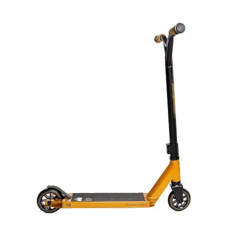 The Nitro Circus Ryan Williams Junior Replica 2025 Complete Stunt Scooter in gold and black features black handlebars, small black wheels, and a textured foot deck, shown against a plain white background.