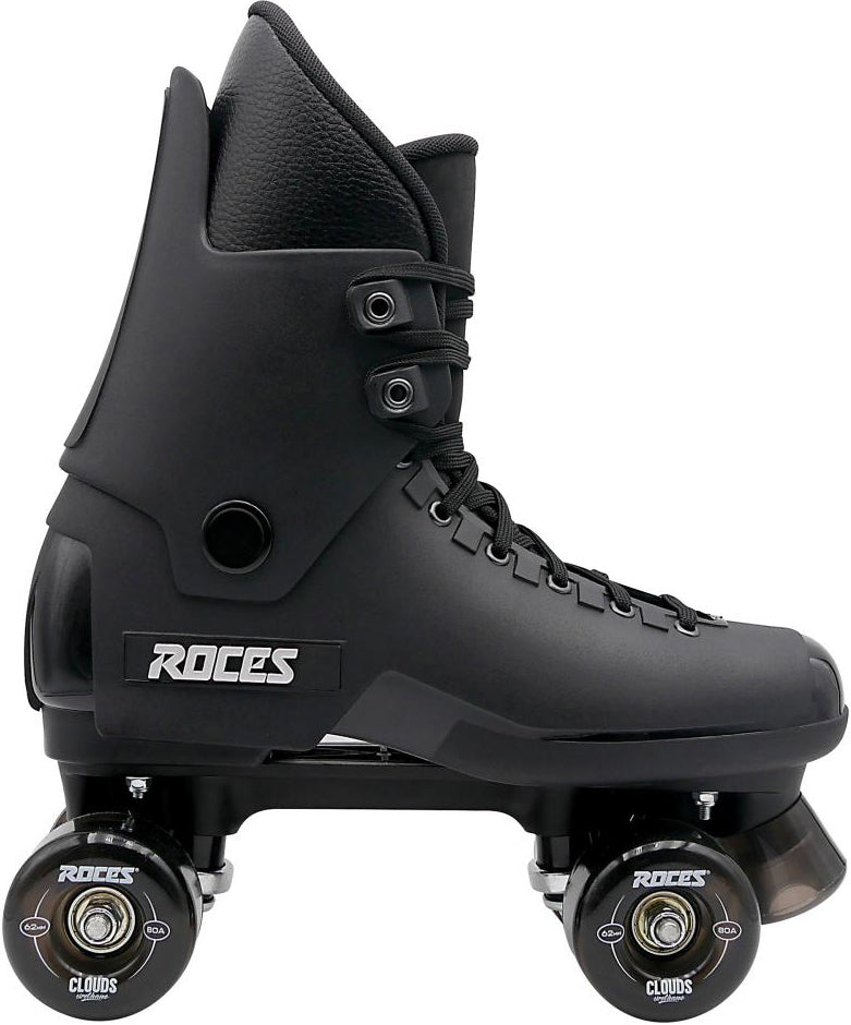 A black Roces Pro 80 Nucleus Quad Roller Skate featuring a high-ankle boot, black laces, and four black wheels. The side of the boot displays the white “ROC” logo, making these Roces skates a stylish and durable option for anyone seeking sleek quad roller skates.