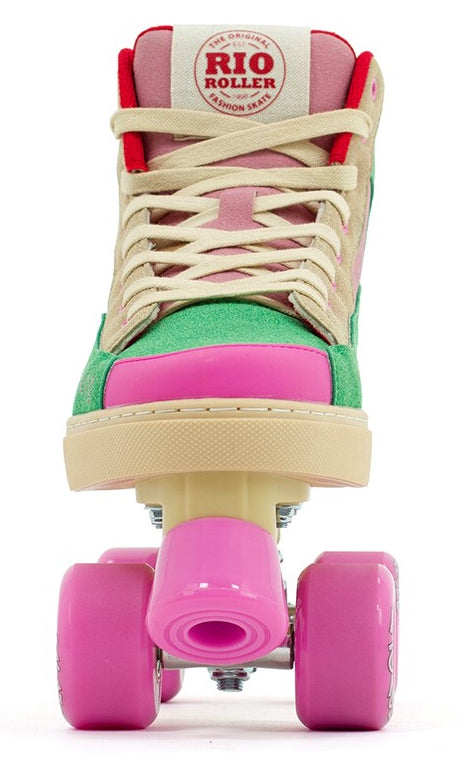 The Rio Roller Beats Quad Roller Skates - Pink / Green by Rio Roller are vegan high-top skates with green, pink, and beige panels, cream laces, bright pink wheels and toe stop, plus a "Rio Roller Fashion Skate" tongue label.