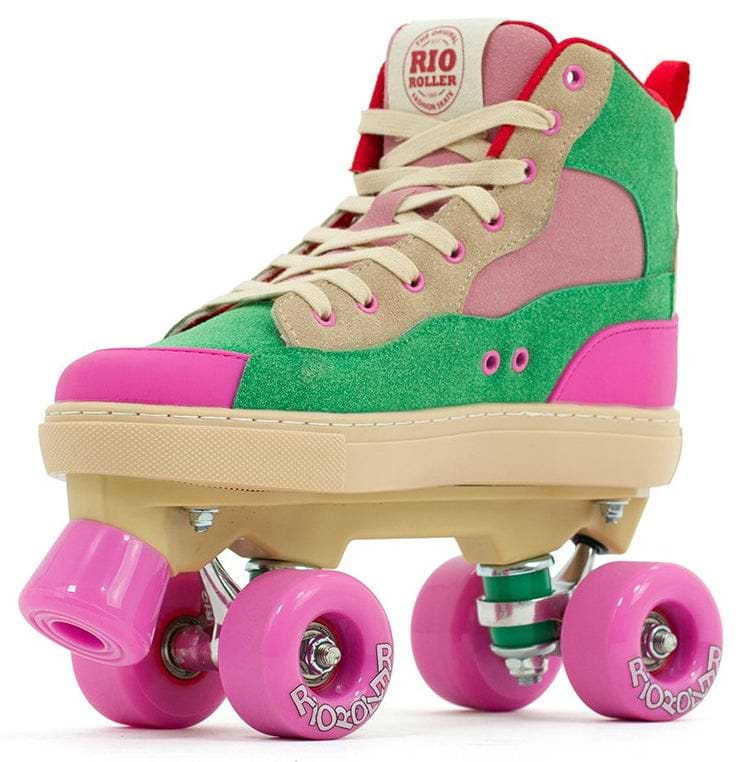 The Rio Roller Beats Quad Roller Skates - Pink / Green feature a vibrant vegan high-top design in green, pink, and beige with cream laces, pink wheels, a beige sole, and the "Rio Roller" logo on the tongue.