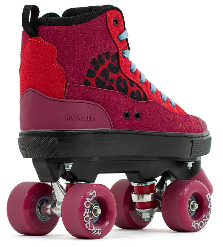 The Rio Roller Beats Quad Roller Skates - Red / Leopard feature a red and pink high-top sneaker style, blue laces, black leopard print sides, black sole, four pink wheels, and vegan-friendly Rio Roller branding on side and wheels.