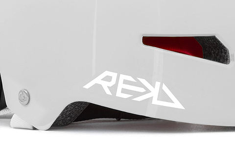 Close-up of the REKD Elite 2.0 Skate / Scooter Helmet in gloss silver, a certified REKD helmet for action sports, featuring bold branding, silver shell with vent details, and textured black interior padding.