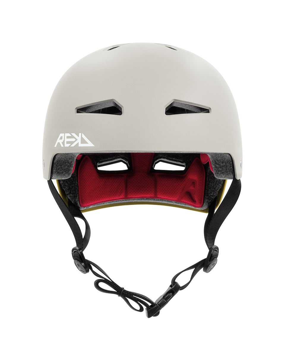 The REKD Elite 2.0 Skate / Scooter Helmet in grey/yellow is a lightweight action sports helmet with black ventilation slits, yellow interior padding, and an adjustable black chin strap, shown from the front.