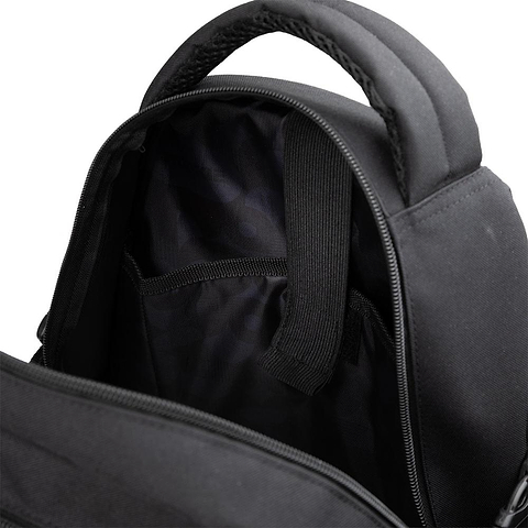 A close-up view of the inside of the Rookie Skatepack Classic 78 25 L Backpack by Rookie in black, featuring an open zipper, a padded handle, and an inner compartment with a fabric divider and strap—perfectly organized for any skate backpack enthusiast.