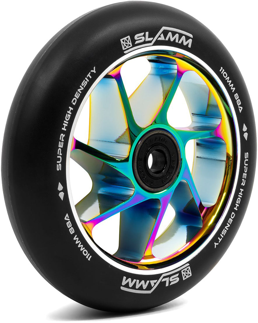 Introducing the Slamm Team 110mm Stunt Scooter Wheel – Black / Neochrome: a high-performance wheel from Slamm featuring “Super High Density” text on the rim and a striking, colorful neochrome geometric core design, ideal for riders seeking premium 110mm stunt scooter wheels.