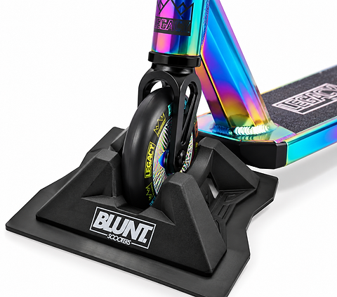 A close-up of a 30mm wide scooter wheel in a Blunt Envy Scooter Stand V2 - Black, with part of the deck and LEGACY branding visible.
