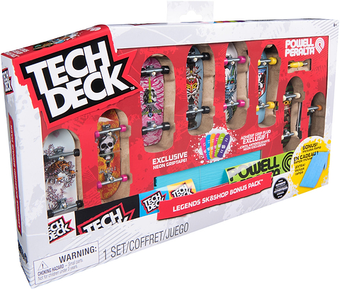 Tech Deck Legends Sk8Shop Fingerboards 8 Pack featuring eight fingerboards with varied graphic designs and a blue plastic ramp in a display box.