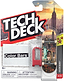A Tech Deck 96mm M61 Fingerboard - Color Bars featuring a New York City cityscape graphic, packaged with a small red plastic tool in a cardboard blister pack.
